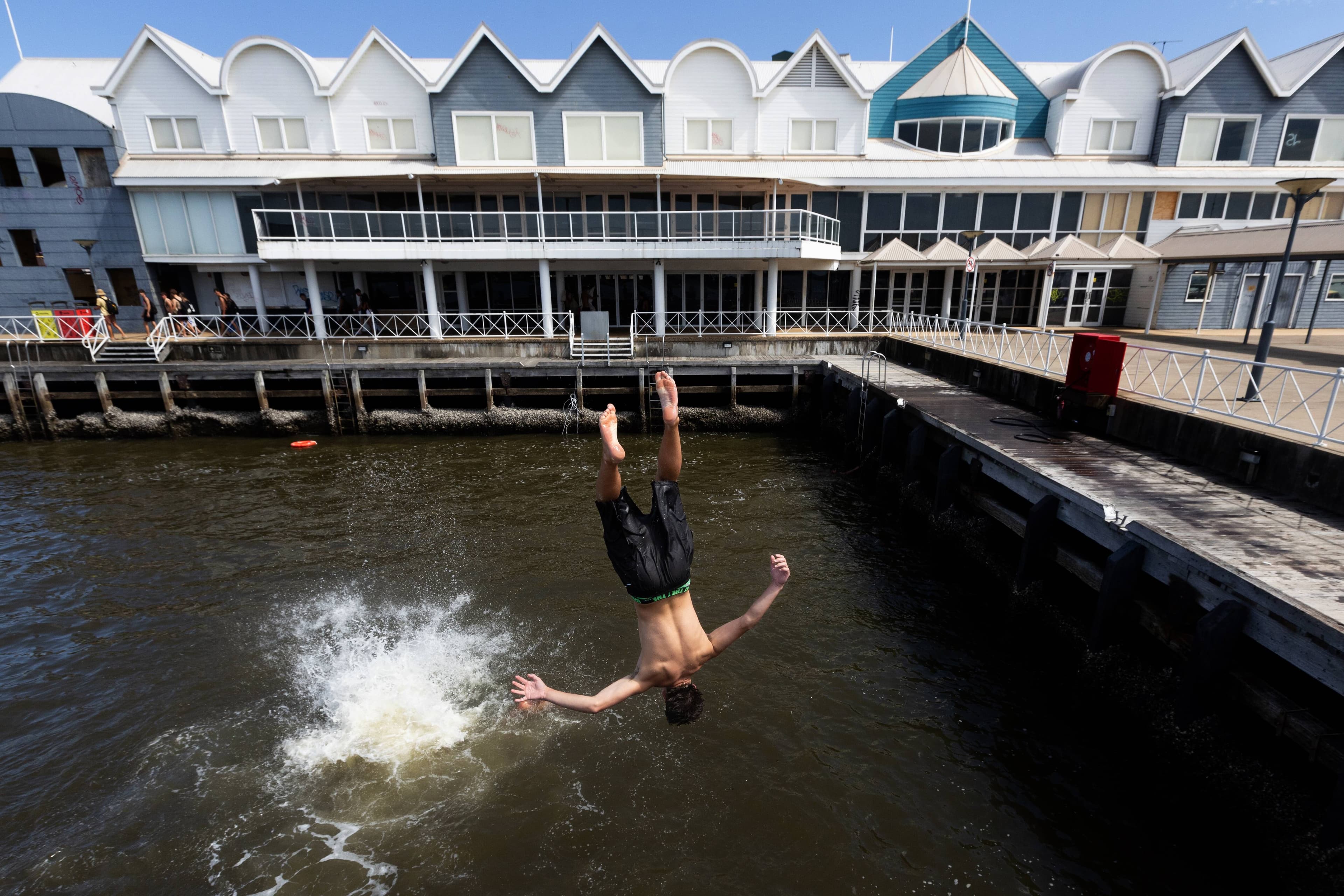 Newcastle kids beating the heat during a major heatwave at Queens Wharf. Picture by Jonathan Carroll