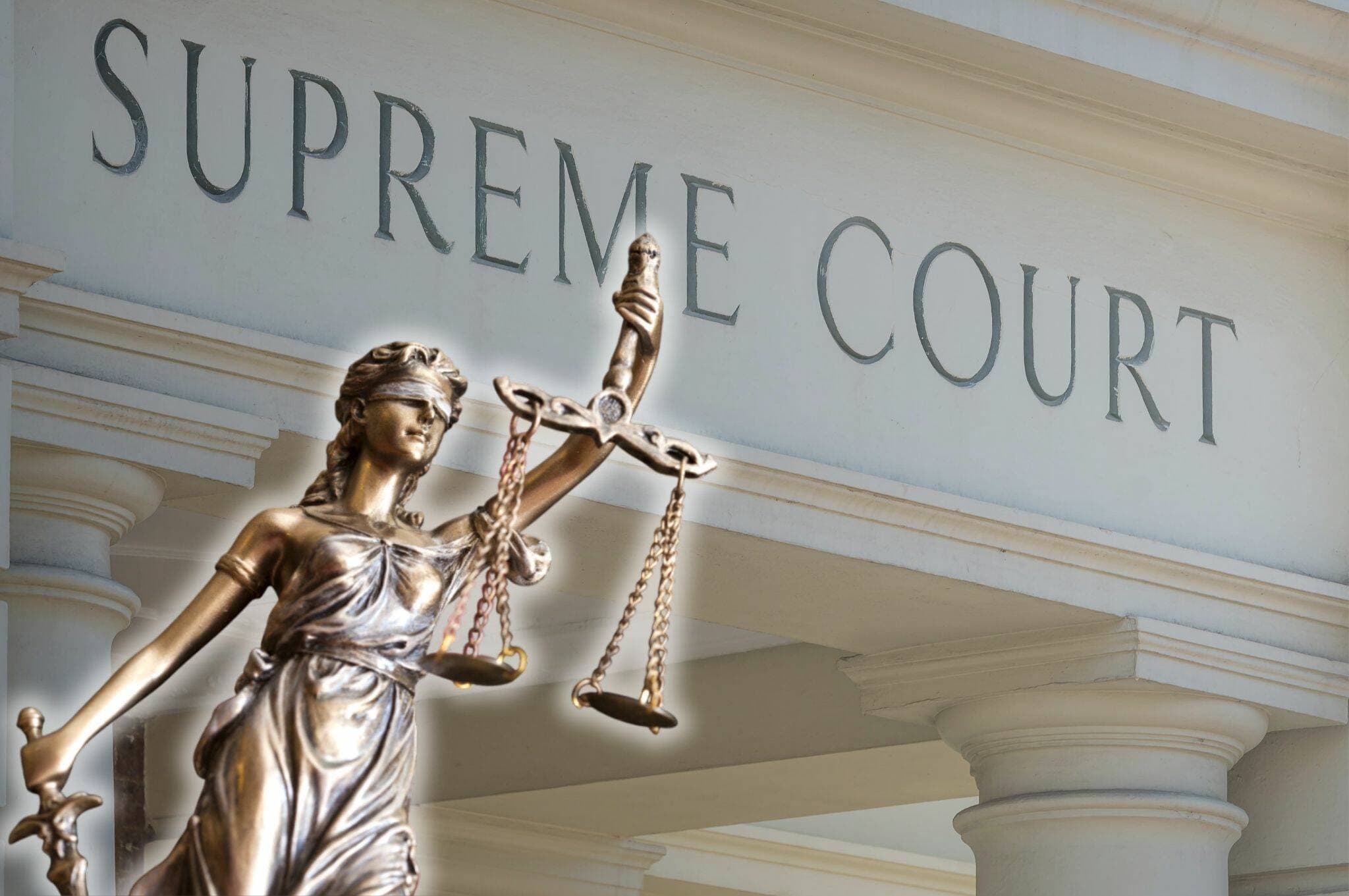 The Supreme Court in Launceston behind a statue of justice. File pictures by Craig George, Shutterstock