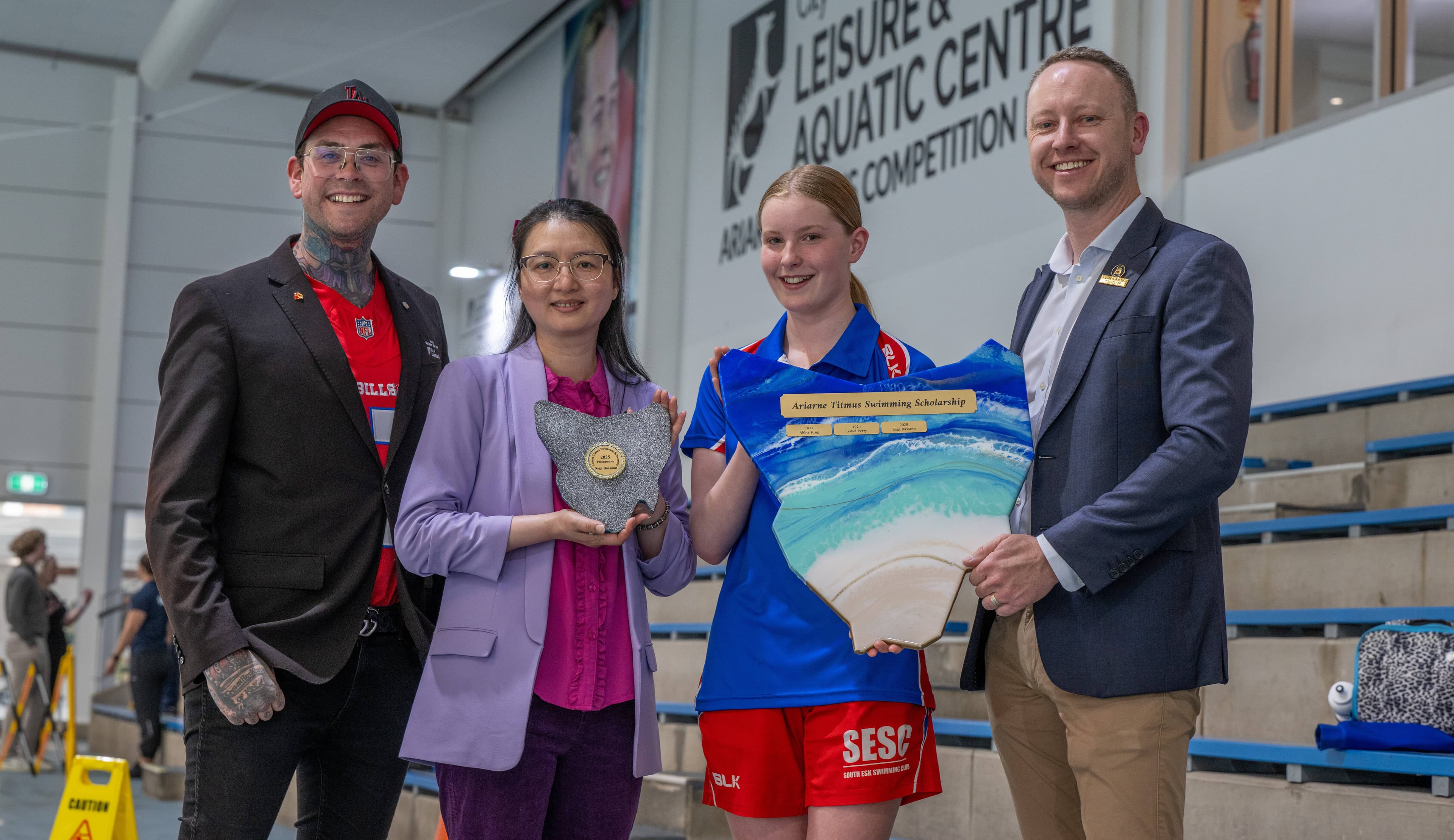 Sage Bassano with mayor Matthew Garwood, councillor Susie Kai and councillor Andrew Palmer.