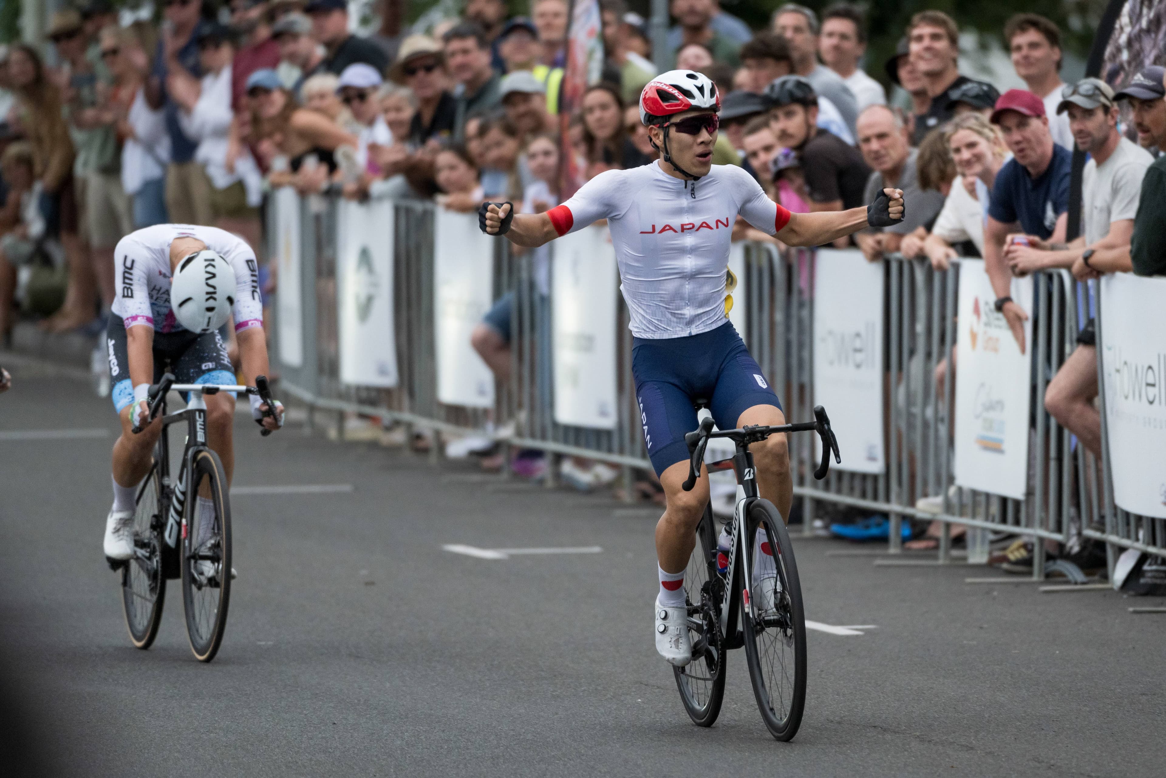 Japan's Shoi Matsuda finishes ahead of Launceston's Hamish McKenzie in the men's elite racein the 2024 Gilmore Cycling Classic. Picture by Phillip Biggs
