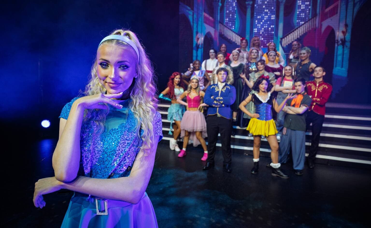 Jamisen Cleaver as Cinderella with the cast of Once Upon a One More Time, on stage at the Princess Theatre in August.