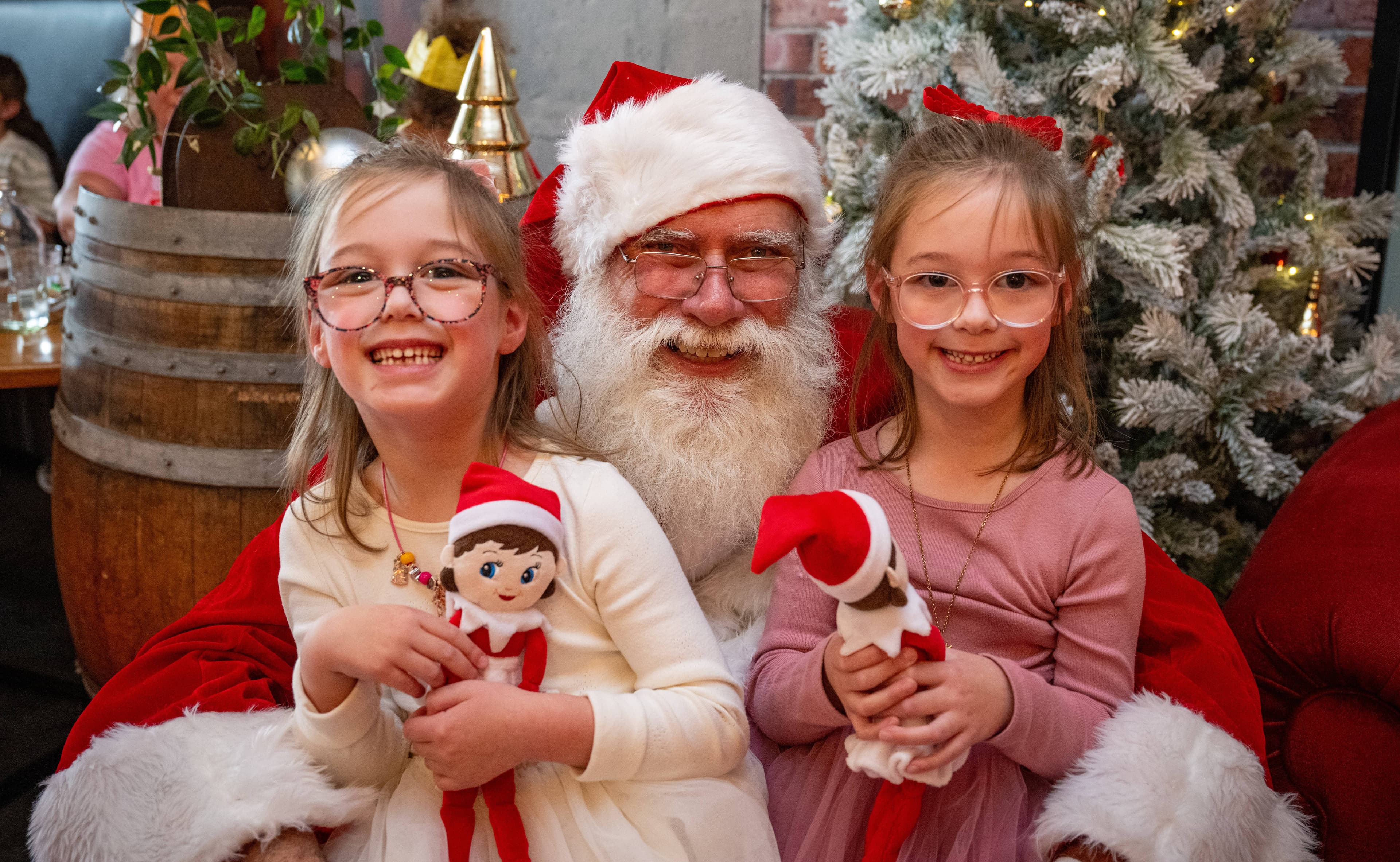 Santa made a special visit to the Cataract on Paterson's Magical Lunch on November 22, and had this photo taken with twin sisters, Elsie and Ava Fawdry, 5, of Launceston.