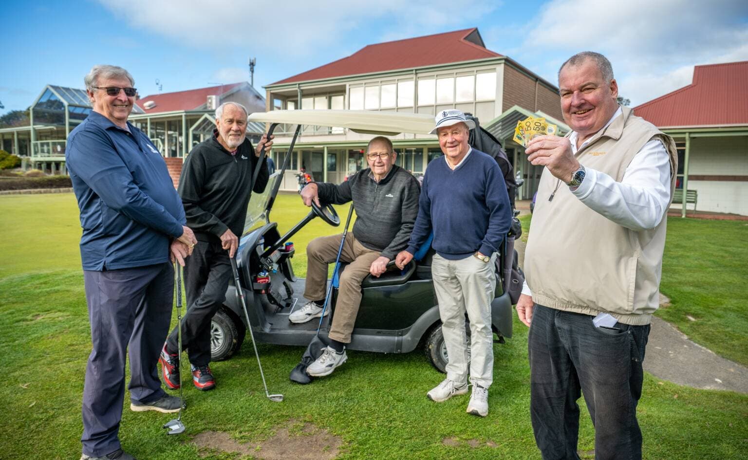 Chris Williams President of the Launceston Golf Club with a donation to the Examiner Winter Relief appeal, with Greg Murden (Events co-ordinator), Ross Millar (treasurer), Glenn Woods and Graeme Gregor.