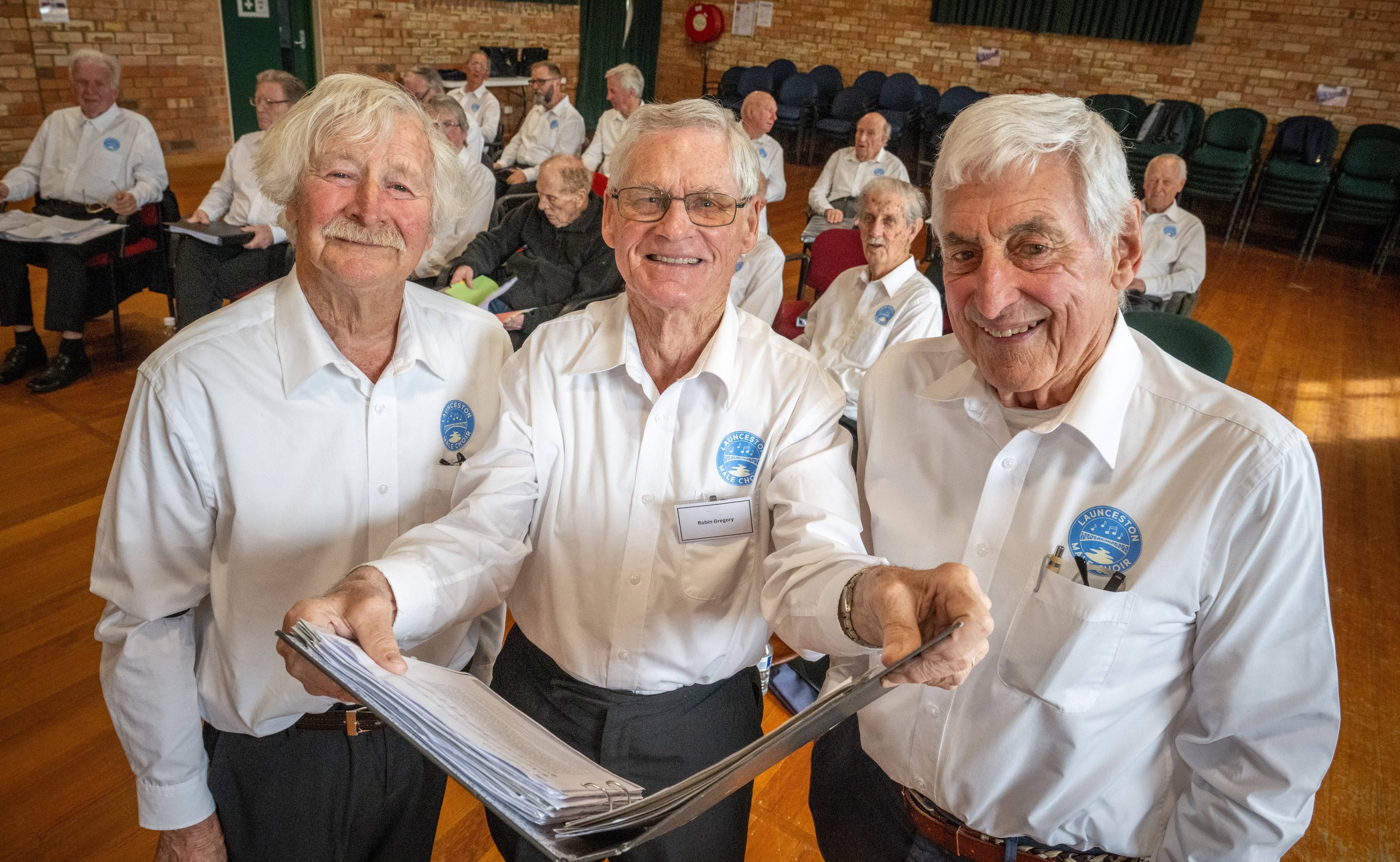 Peter Hunt (President), Robin Gregory (member for 50 years) and John Baily of the Launceston Male Choir during rehearsals for an upcoming concert to celebrate their 90th year.