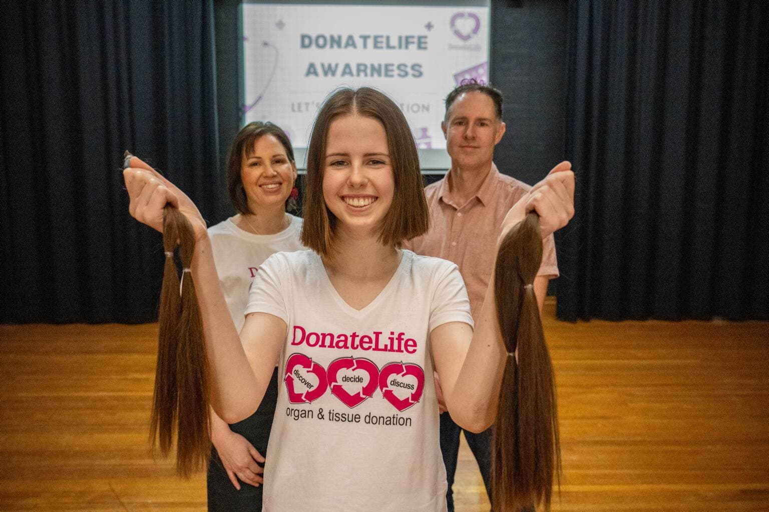 Delilah Barrett with parents Sarah and James Barrett at Queechy High School on August 1.