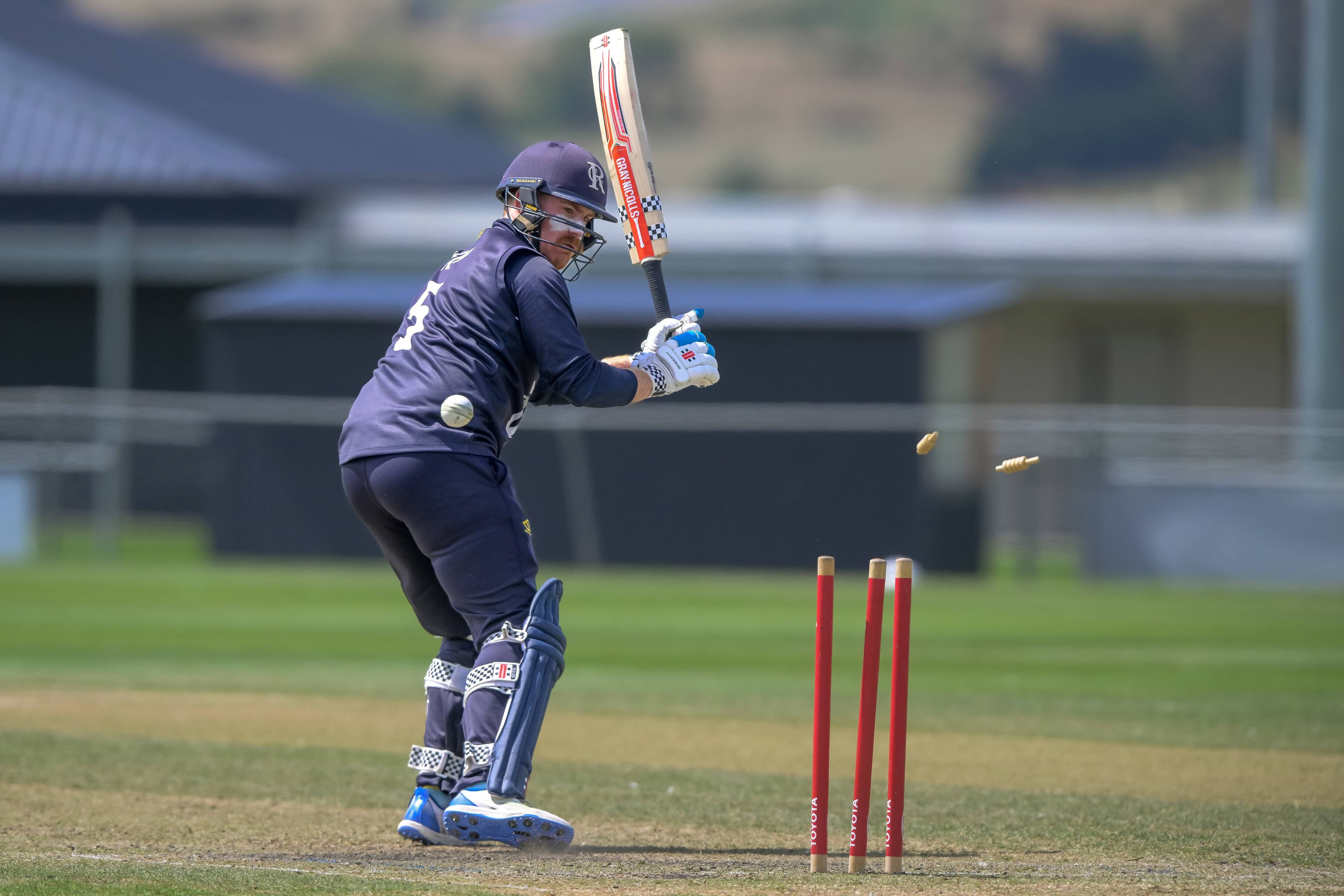 Riverside captain Peter New is bowled during the Riverside vs Burnie Greater Northern Cup grand final at Windsor Park on January 19, 2025.