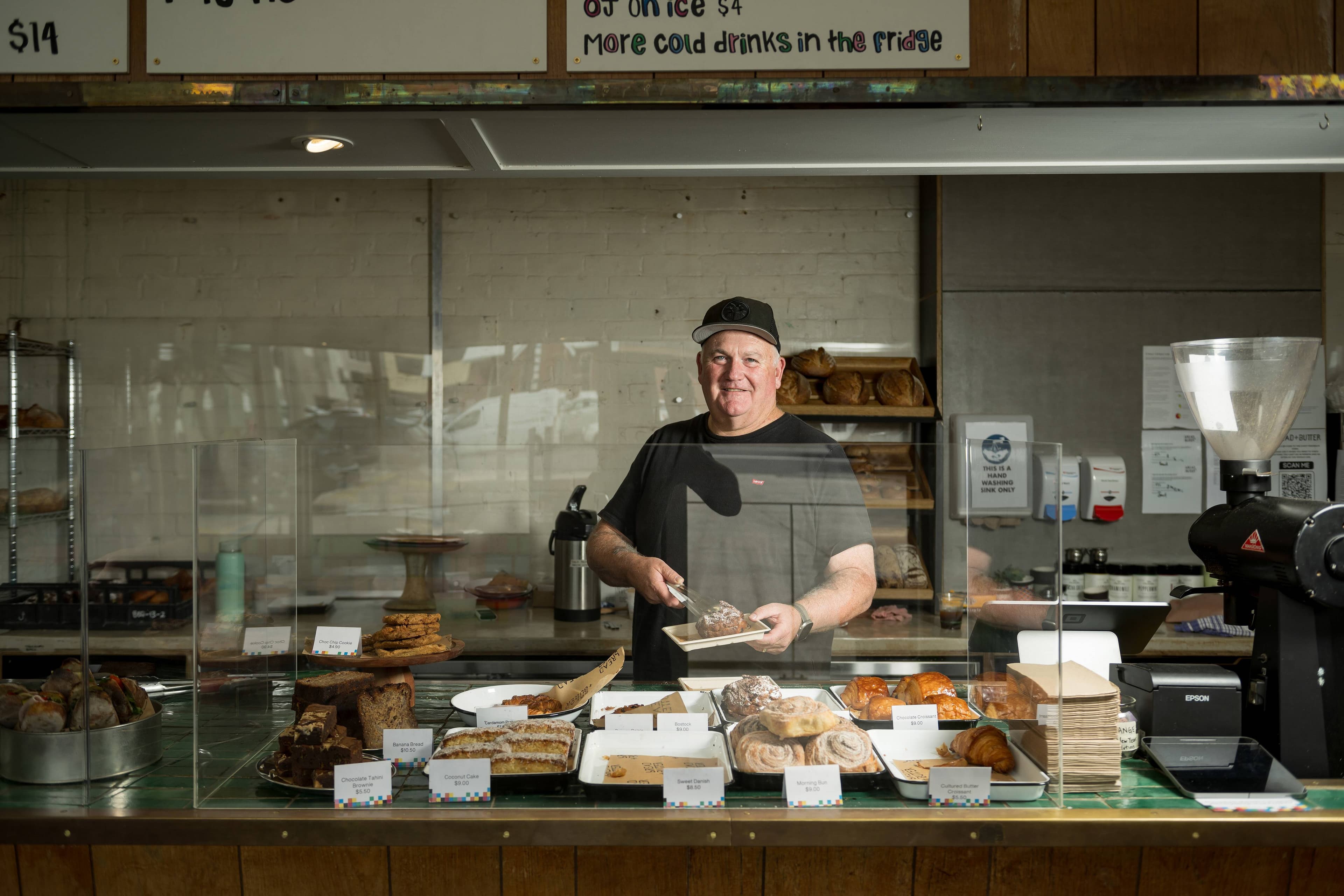 Co-owner Rob Morrison at Bread and Butter's George Street store in the old Rankin and Bond building, Launceston.