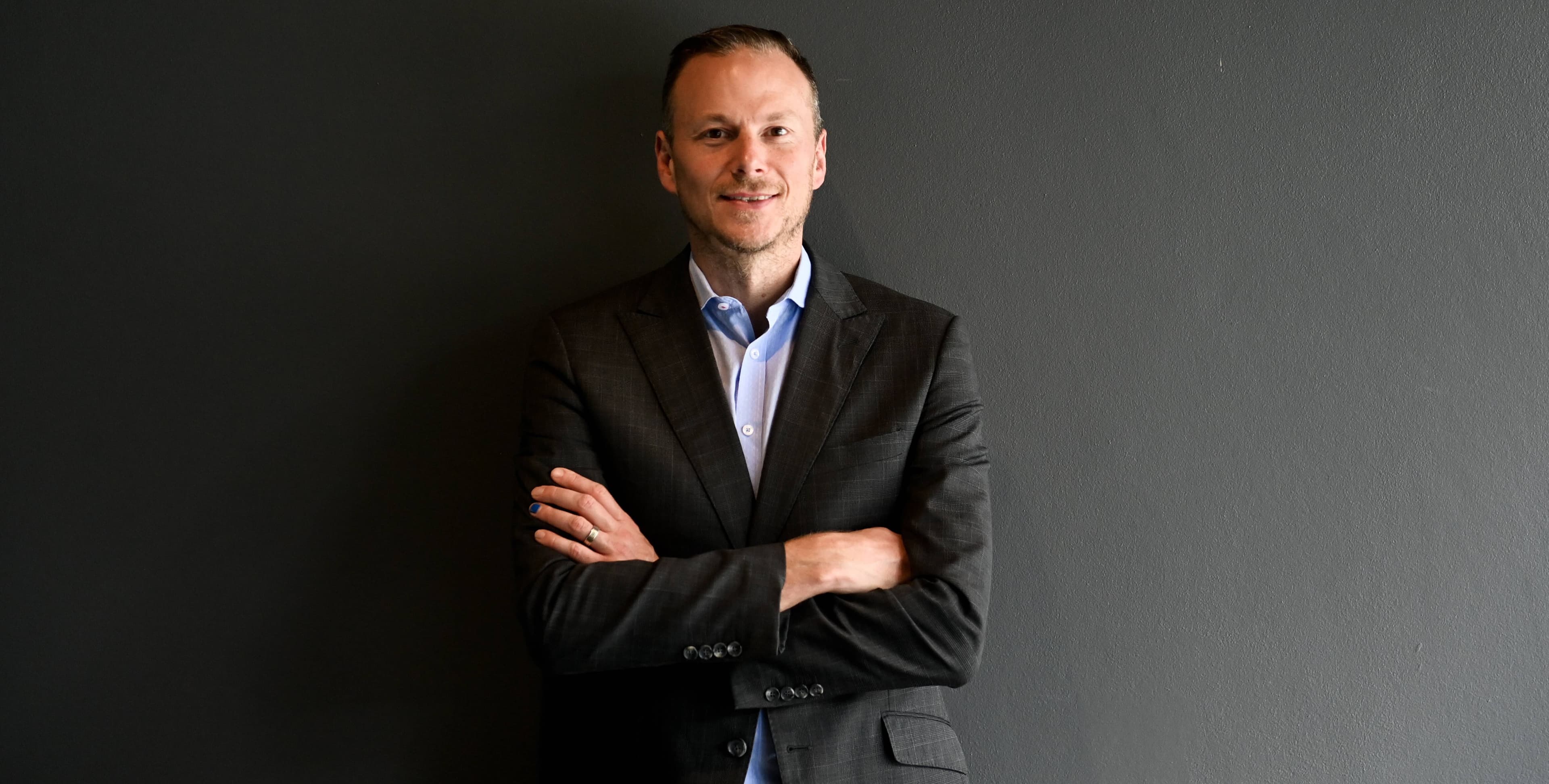 "Together we're helping businesses move more efficiently, cut emissions and reduce costs." Custom Fleet president Chris Tulloch. Picture supplied