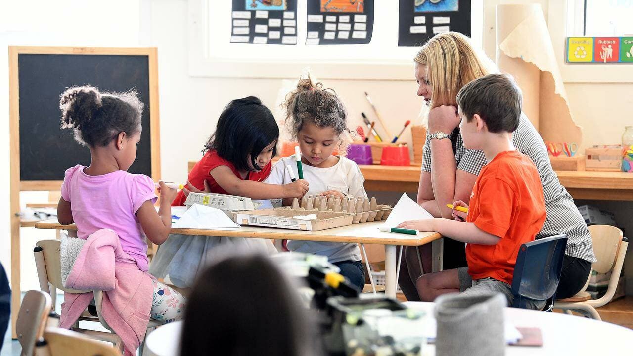 A guaranteed three days of subsidised childcare has been made available regardless of parents' work. (Dave Hunt/AAP PHOTOS)